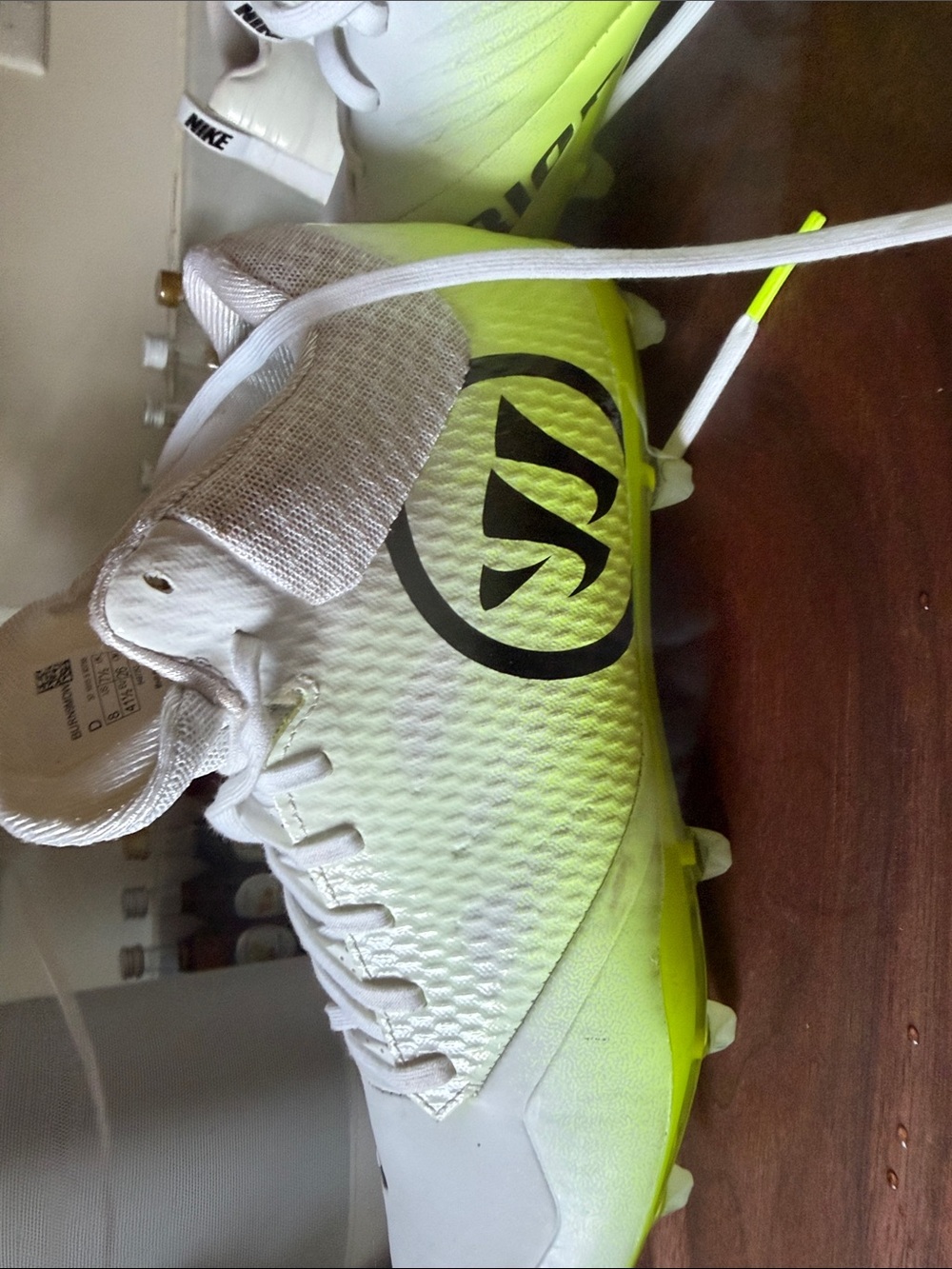 Warrior Kids Cleats in White and Neon Yellow